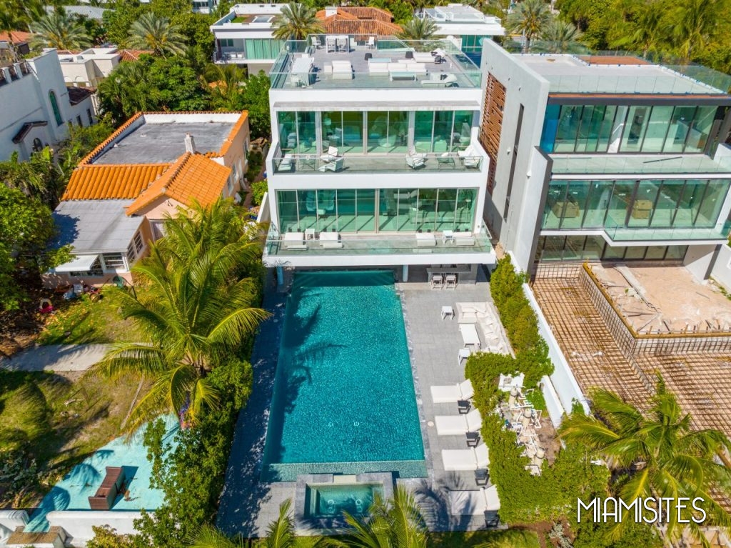Aerial Shot of Modern Beachfront Villa with Rooftop and pool