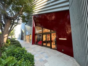 Sidewalk view of Luxury Designer Store Front in Miami